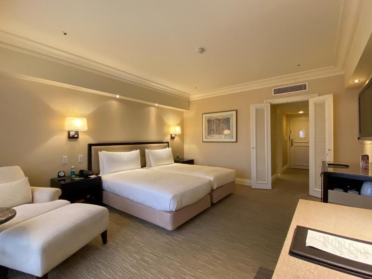 The Sherwood Taipé Exterior foto A room at the Fullerton Hotel
